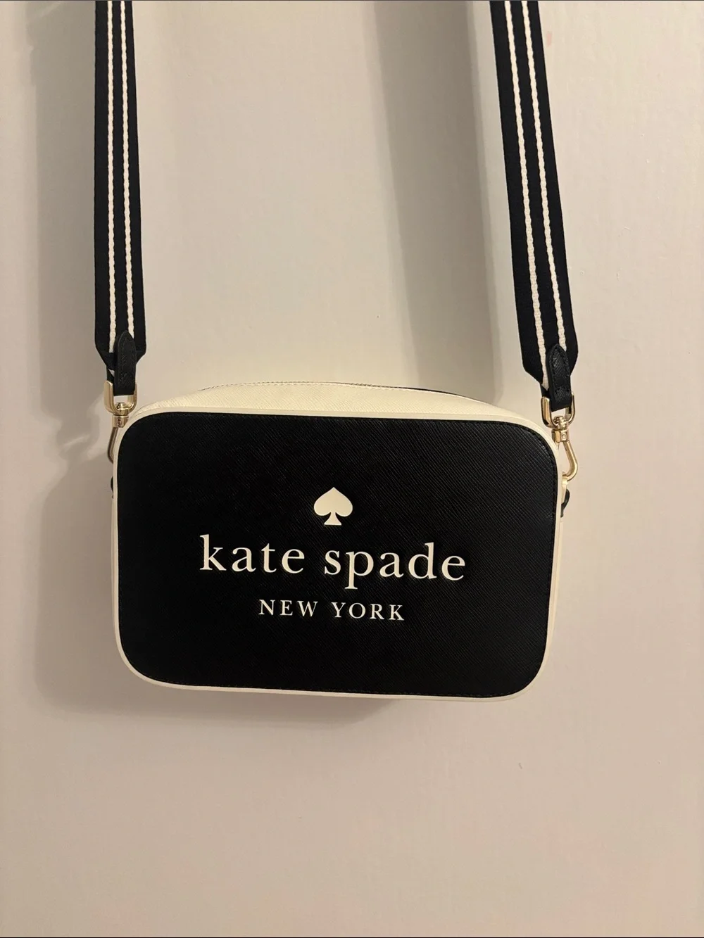Kate Spade Black and White Logo Crossbody Bag with Striped Strap
